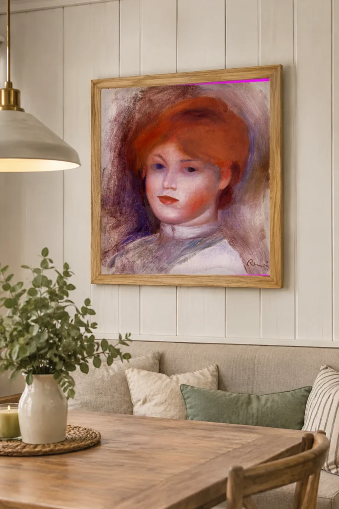 Framed print of Sketch of a Young Woman’s Head, Red Hair and White Collar hanging on a wall in a furnished room