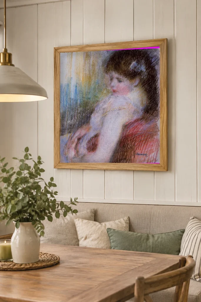 Framed print of Seated Woman hanging on a wall in a furnished room
