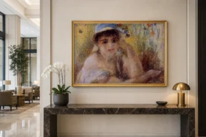 Framed print of Woman in Straw Hat hanging on a wall in a furnished room
