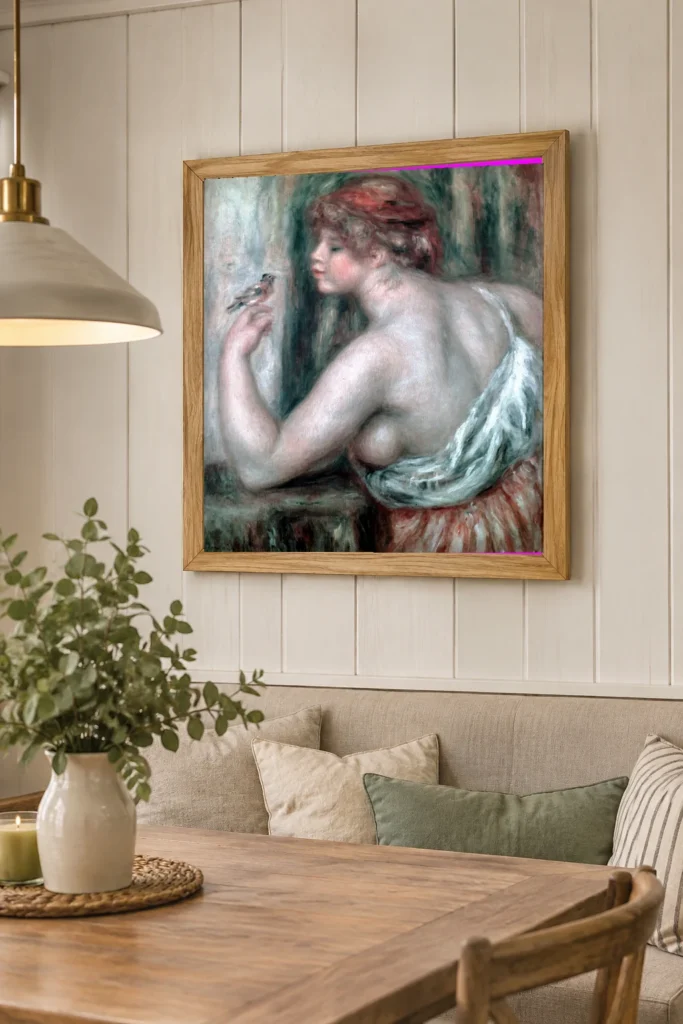 Framed print of Woman with Robin hanging on a wall in a furnished room