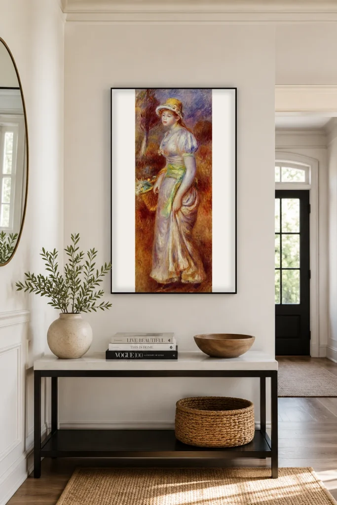Framed print of Woman with Basket of Flowers hanging on a wall in a furnished room
