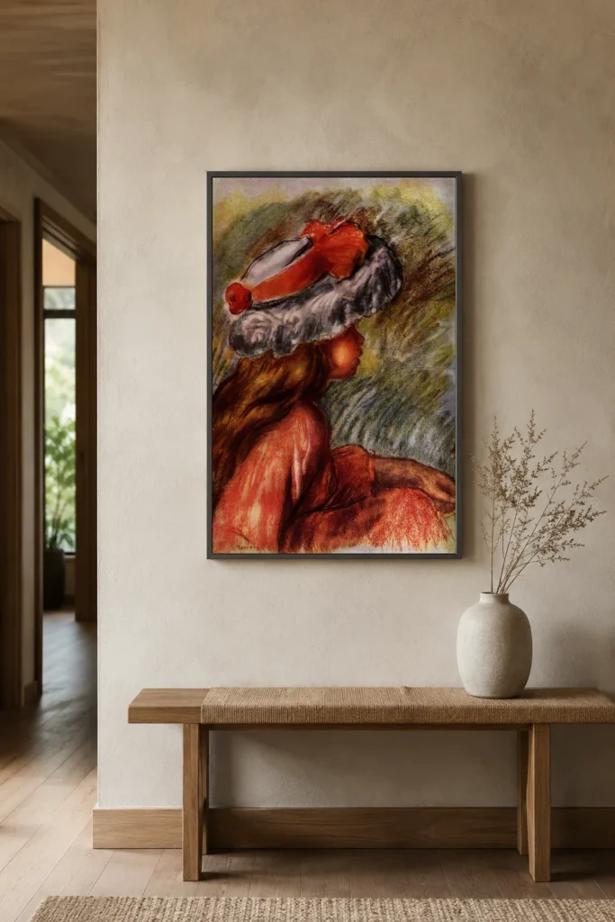 Framed print of Little Girl in a Red and White Hat hanging on a wall in a furnished room