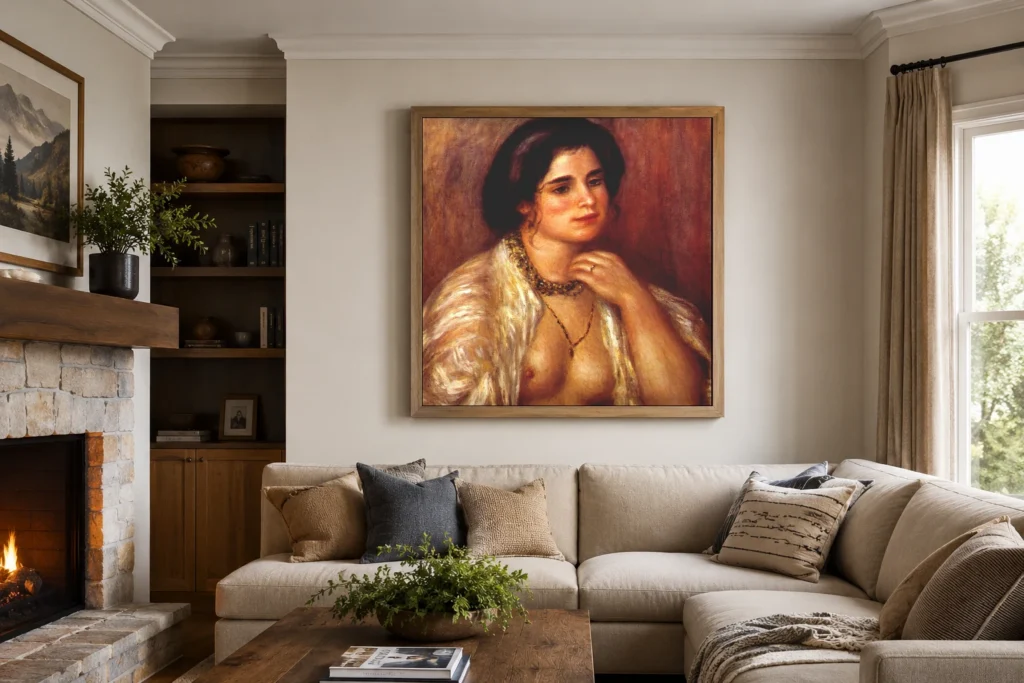 Framed print of Gabrielle with Bare Breasts hanging on a wall in a furnished room