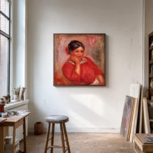 Framed print of Gabrielle with a Rose in a Red Blouse hanging on a wall in a furnished room