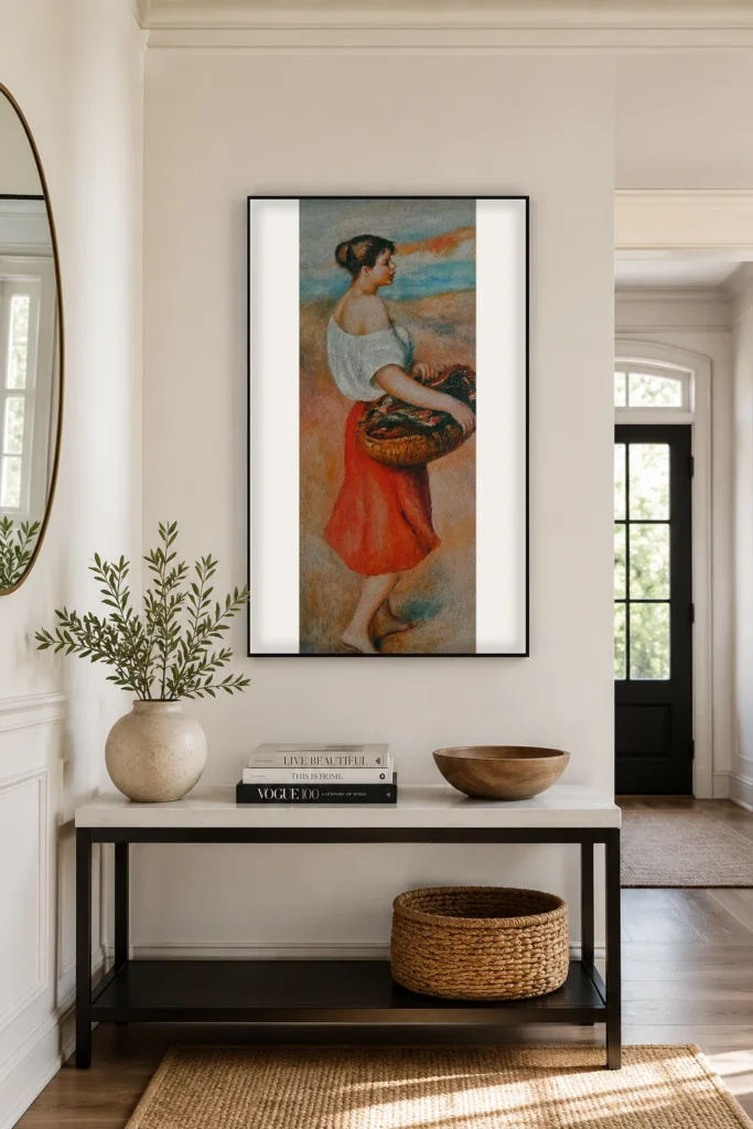 Framed print of Girl with a Basket of Fish hanging on a wall in a furnished room