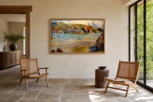 Framed print of Guernesey hanging on a wall in a furnished room