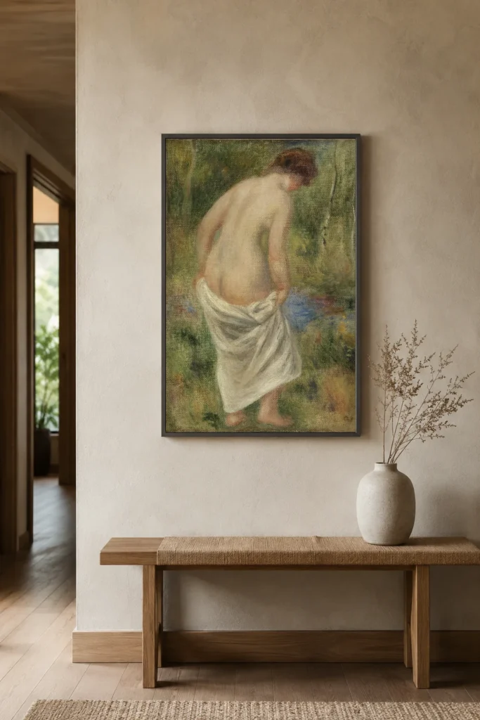 Framed print of After the Bath (Après le bain) hanging on a wall in a furnished room