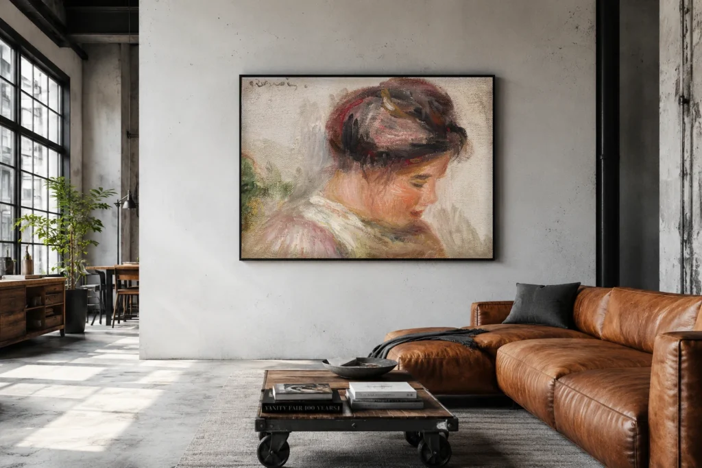 Framed print of Head of Young Girl (Tête de jeune fille) hanging on a wall in a furnished room