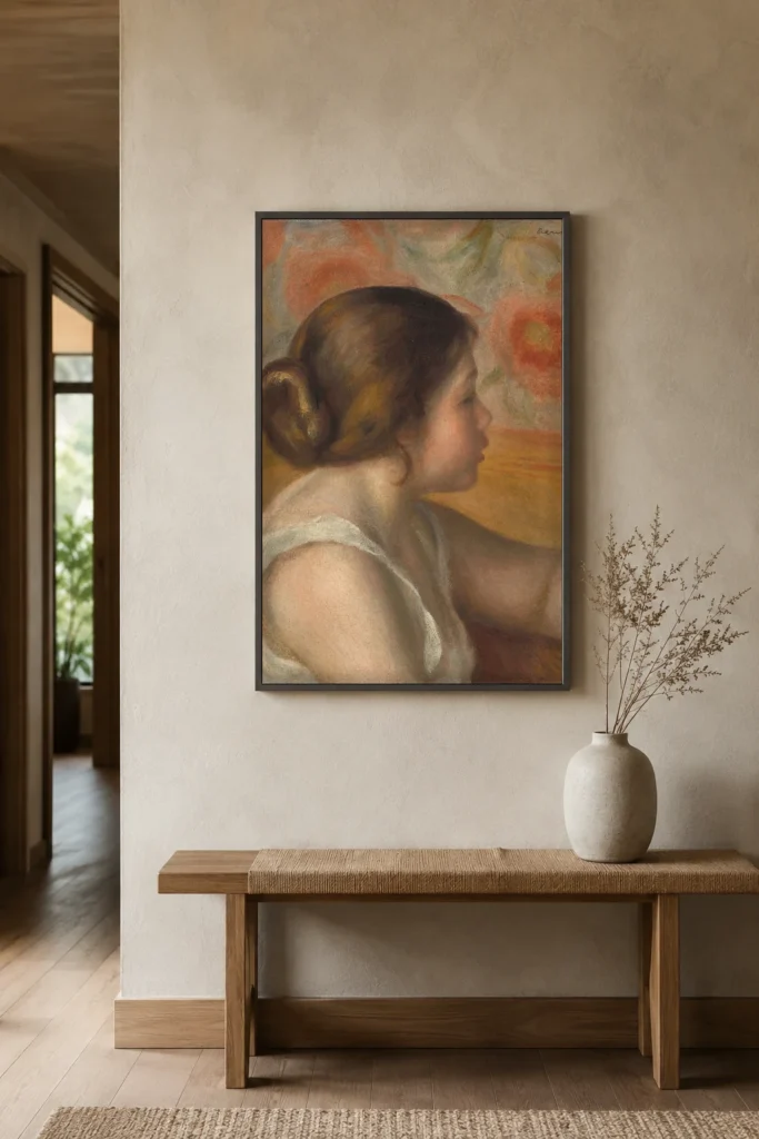 Framed print of Head of a Young Girl hanging on a wall in a furnished room