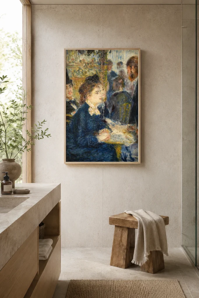 Framed print of In the Café hanging on a wall in a furnished room