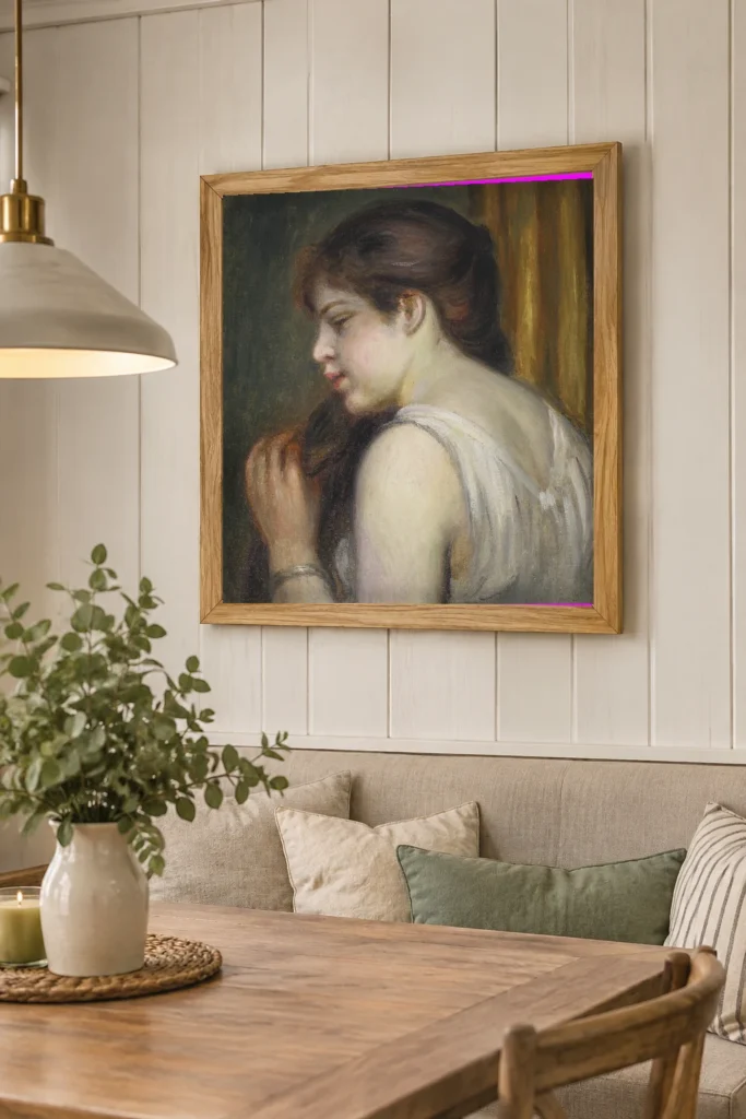 Framed print of Young Girl Combing Her Hair hanging on a wall in a furnished room
