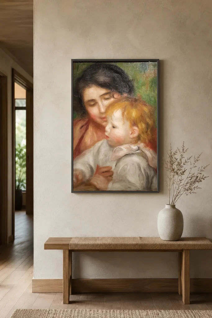 Framed print of Jean Renoir and Gabrielle hanging on a wall in a furnished room