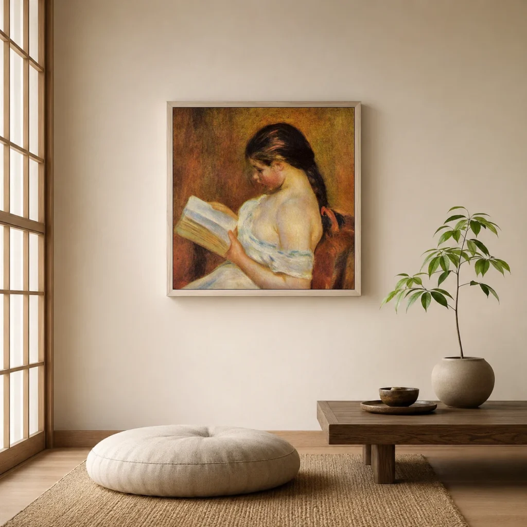 Framed print of Girl Reading, Left Shoulder Bare hanging on a wall in a furnished room