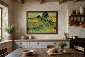 Framed print of The Watering Trough hanging on a wall in a furnished room