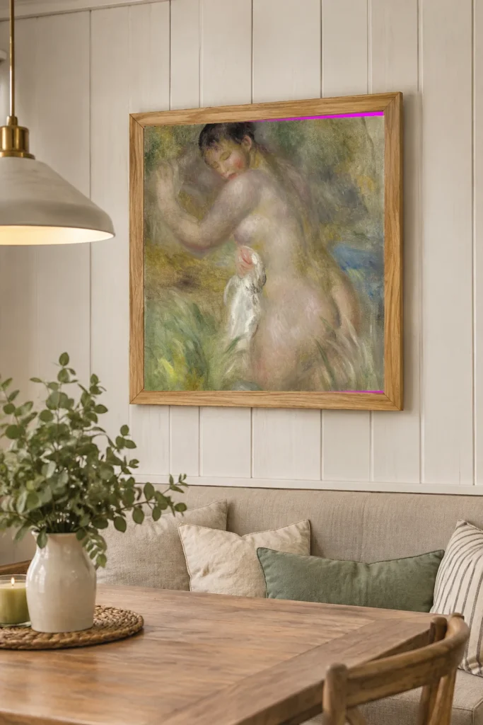 Framed print of The Bather hanging on a wall in a furnished room