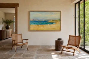 Framed print of The Banks of the Mediterranean hanging on a wall in a furnished room