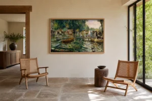 Framed print of La Grenouillère hanging on a wall in a furnished room