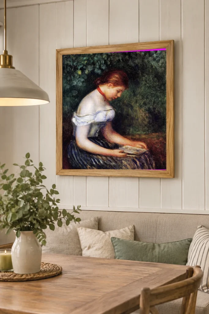 Framed print of The Reader, Seated Woman hanging on a wall in a furnished room