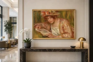 Framed print of Andrée in a Hat, Reading (Andrée en chapeau, lisant) hanging on a wall in a furnished room