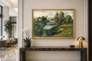 Framed print of Landscape at Vetheuil hanging on a wall in a furnished room