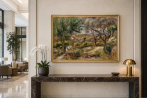 Framed print of Les Collettes à Cagnes hanging on a wall in a furnished room