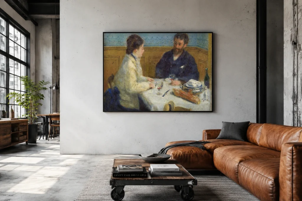 Framed print of Luncheon (Le Déjeuner) hanging on a wall in a furnished room