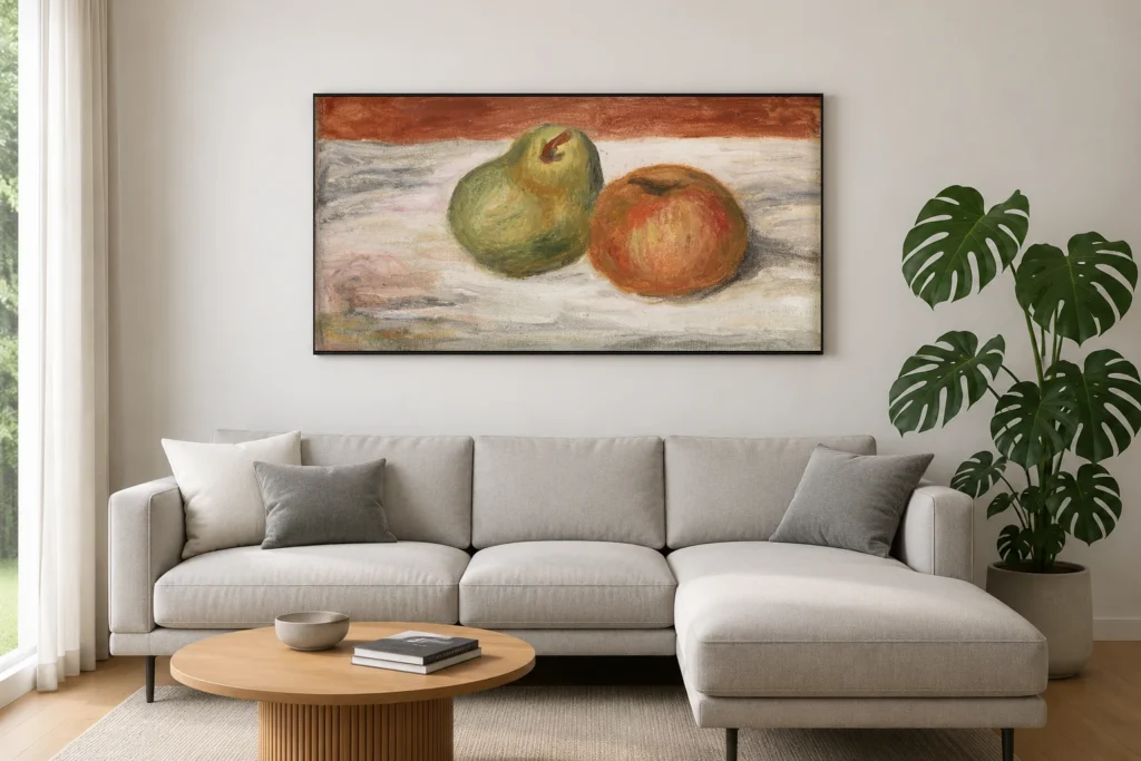 Framed print of Apple and Pear (Pomme et poire) hanging on a wall in a furnished room