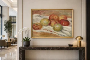 Framed print of Apples and Lemons on a Cloth (Pommes et citrons sur une nappe) hanging on a wall in a furnished room