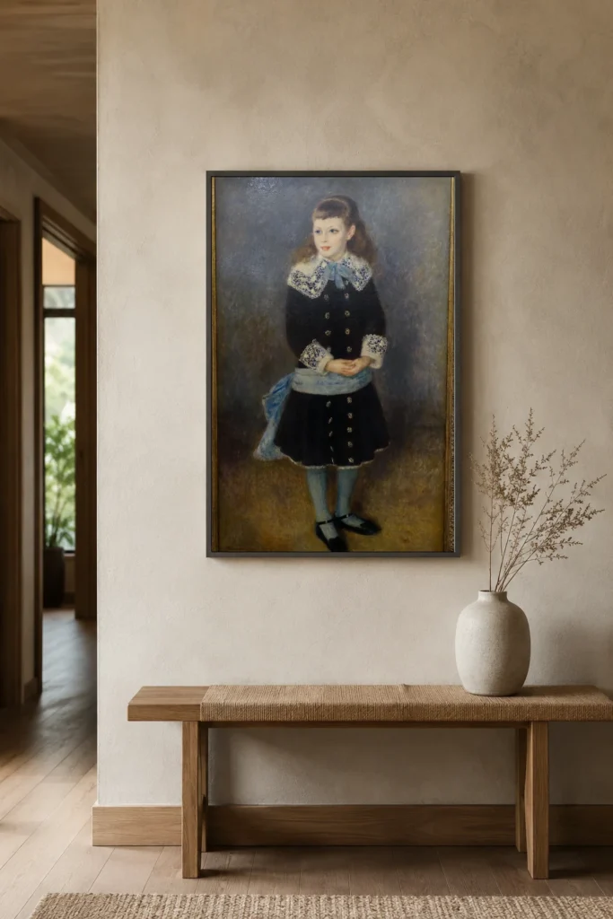 Framed print of Marthe Berard by Pierre-Auguste Renoir hanging on a wall in a furnished room