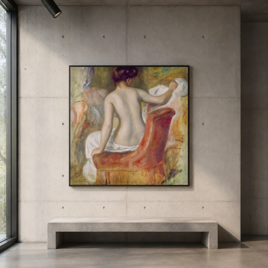 Framed print of Nude in Armchair hanging on a wall in a furnished room
