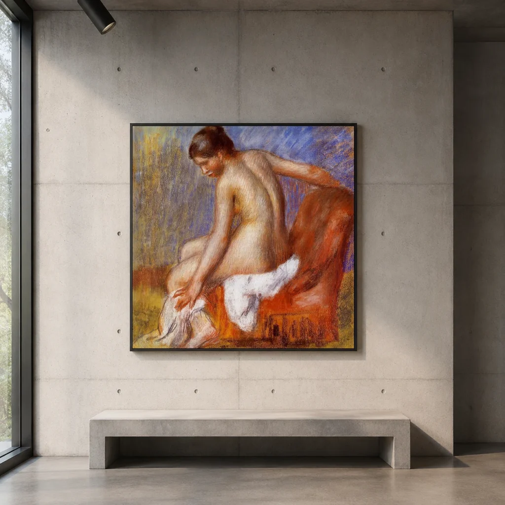 Framed print of Nude in an Armchair hanging on a wall in a furnished room