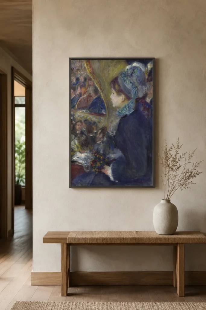 Framed print of At the Theatre (La Première Sortie) hanging on a wall in a furnished room