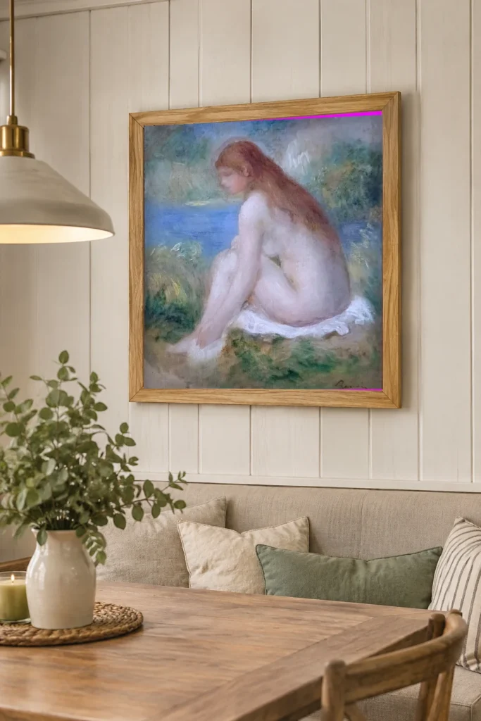 Framed print of Nude Woman Sitting hanging on a wall in a furnished room