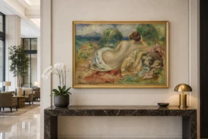 Framed print of Nude in a Landscape hanging on a wall in a furnished room