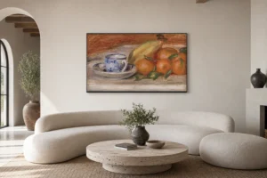 Framed print of Oranges, Bananas, and Teacup (Oranges, bananes et tasse de thé) hanging on a wall in a furnished room