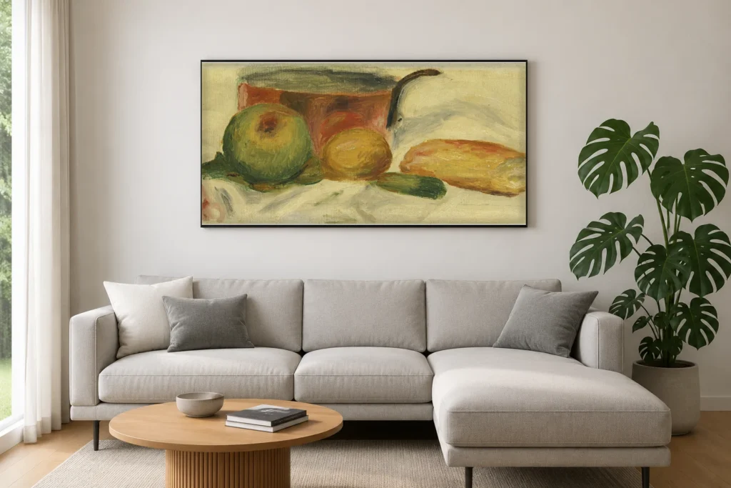 Framed print of Saucepan and Fruit hanging on a wall in a furnished room