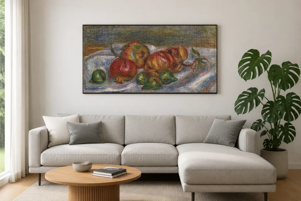 Framed print of Pomegranates hanging on a wall in a furnished room