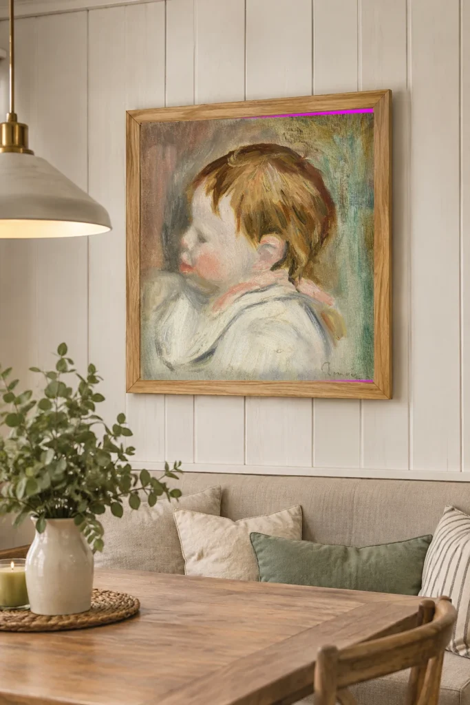 Framed print of Baby’s Head (Tête d’enfant, profil à gauche) hanging on a wall in a furnished room