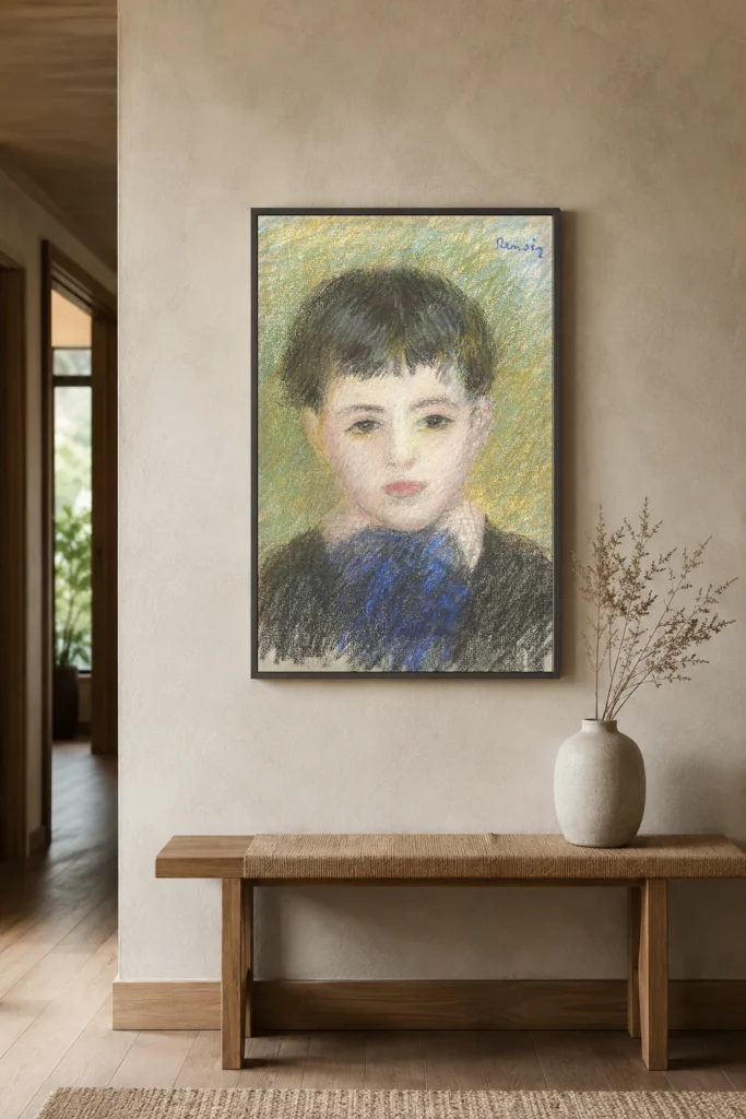 Framed print of Portrait of a Young Boy hanging on a wall in a furnished room