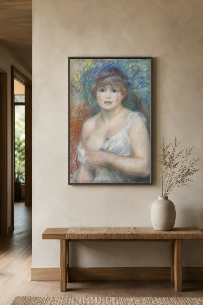 Framed print of Portrait of Jeanne Samary hanging on a wall in a furnished room