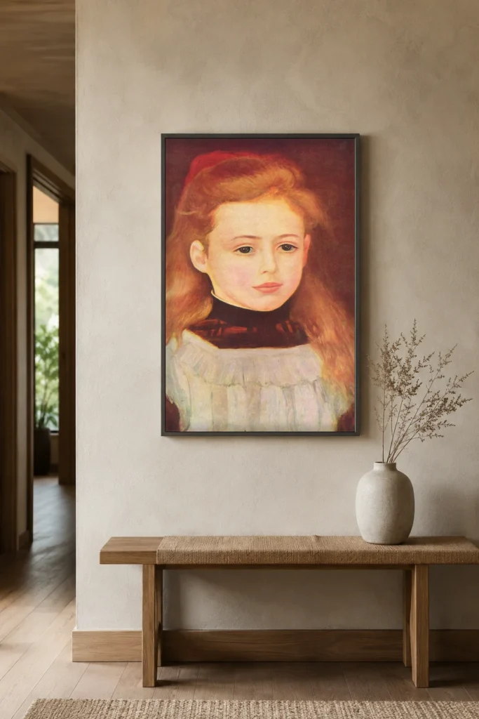 Framed print of Portrait de Lucie Bérard hanging on a wall in a furnished room