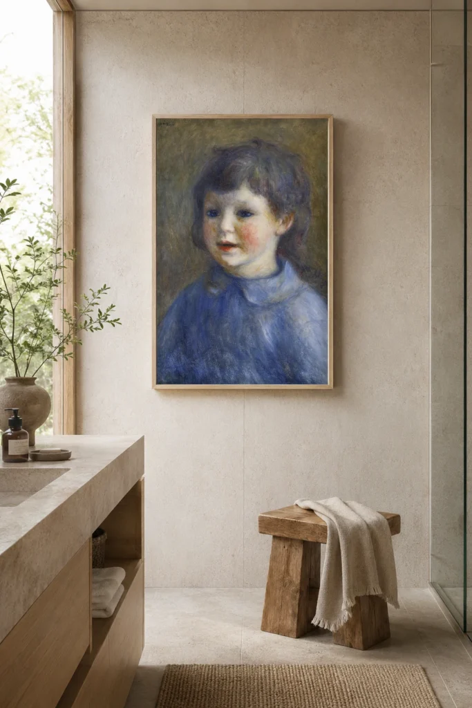 Framed print of Portrait of Pierre Renoir hanging on a wall in a furnished room