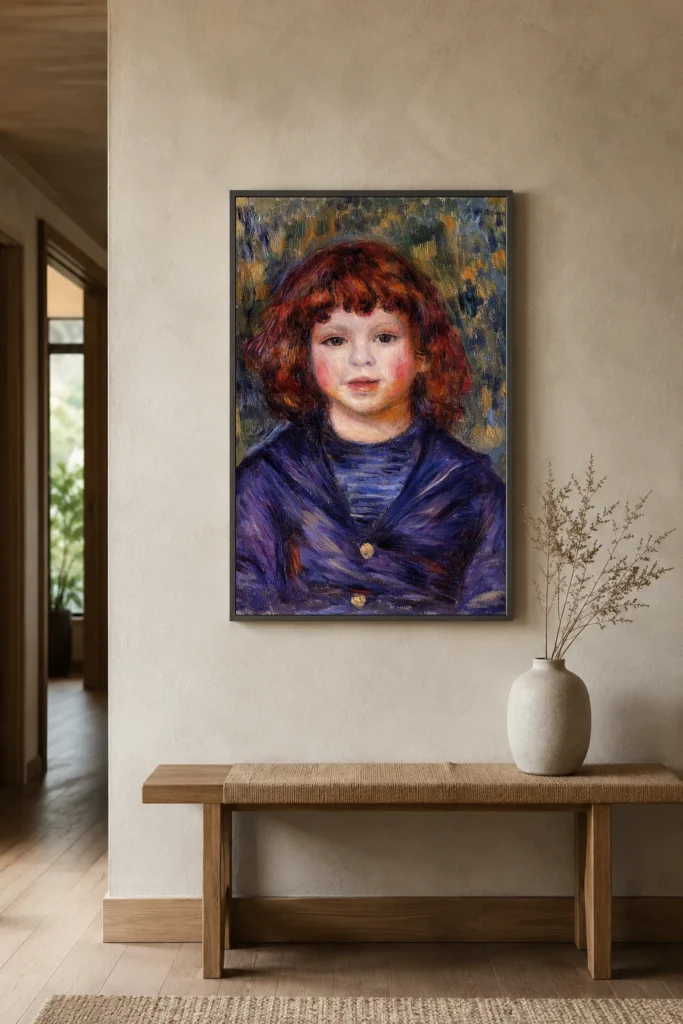 Framed print of Portrait of Pierre Renoir in a Sailor Suit, Facing Front hanging on a wall in a furnished room