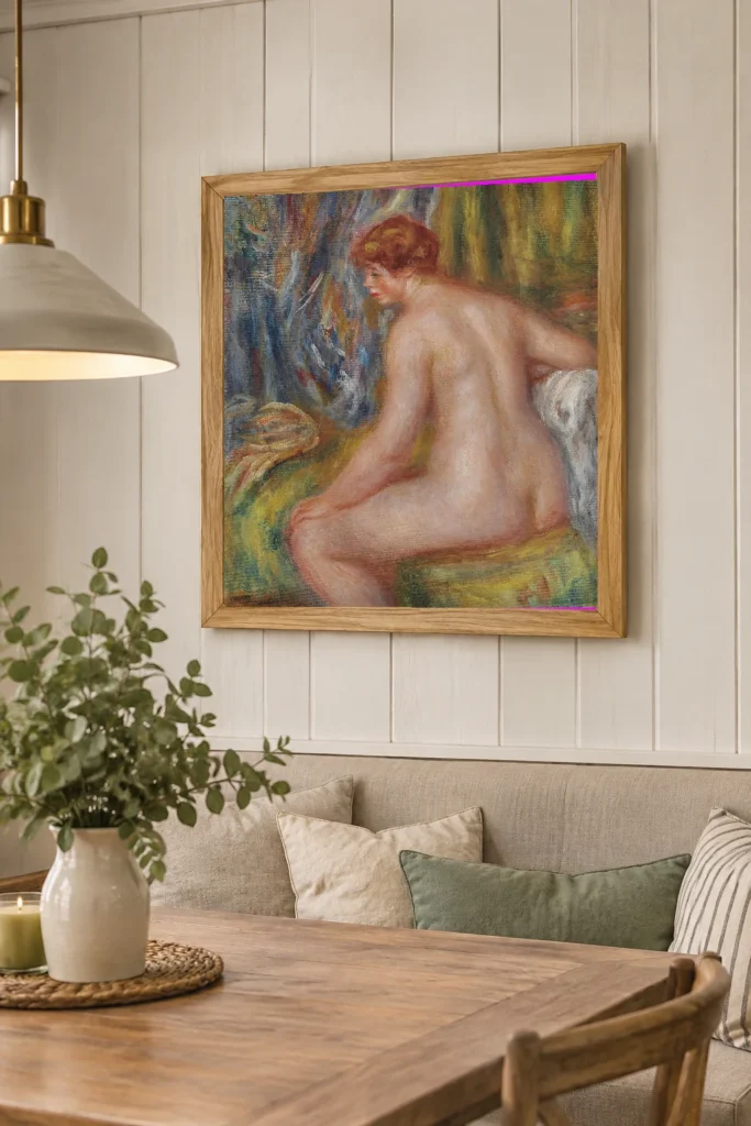 Framed print of Seated Bather hanging on a wall in a furnished room