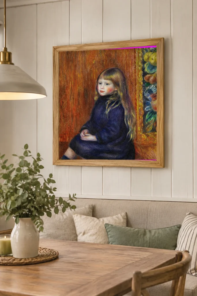 Framed print of Portrait of Edmond Renoir Jr. hanging on a wall in a furnished room