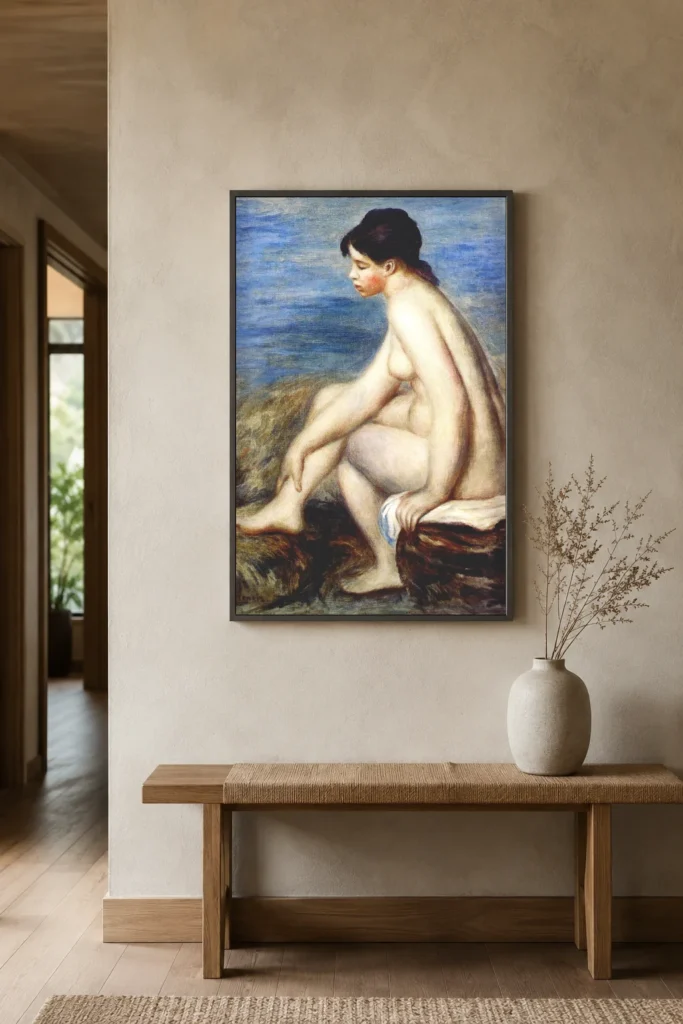 Framed print of Bather Holding Her Foot hanging on a wall in a furnished room