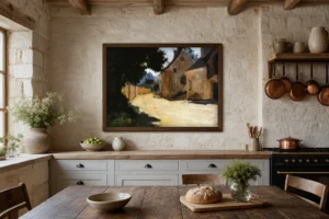 Framed print of Village Street, Louveciennes hanging on a wall in a furnished room
