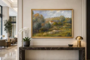Framed print of Springtime in Essoyes hanging on a wall in a furnished room