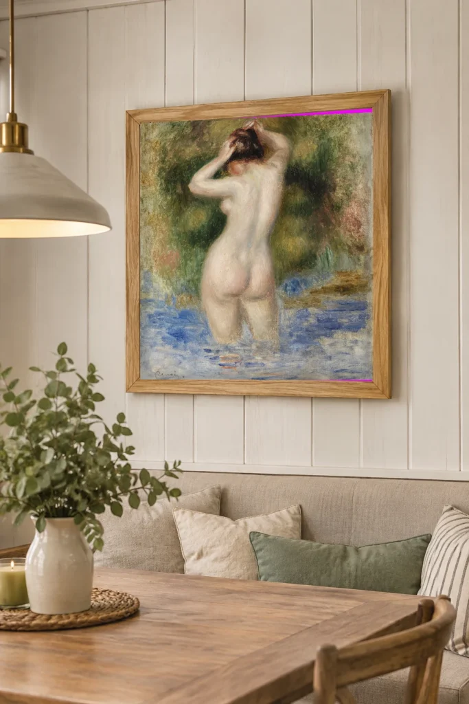 Framed print of Bather (Baigneuse) hanging on a wall in a furnished room