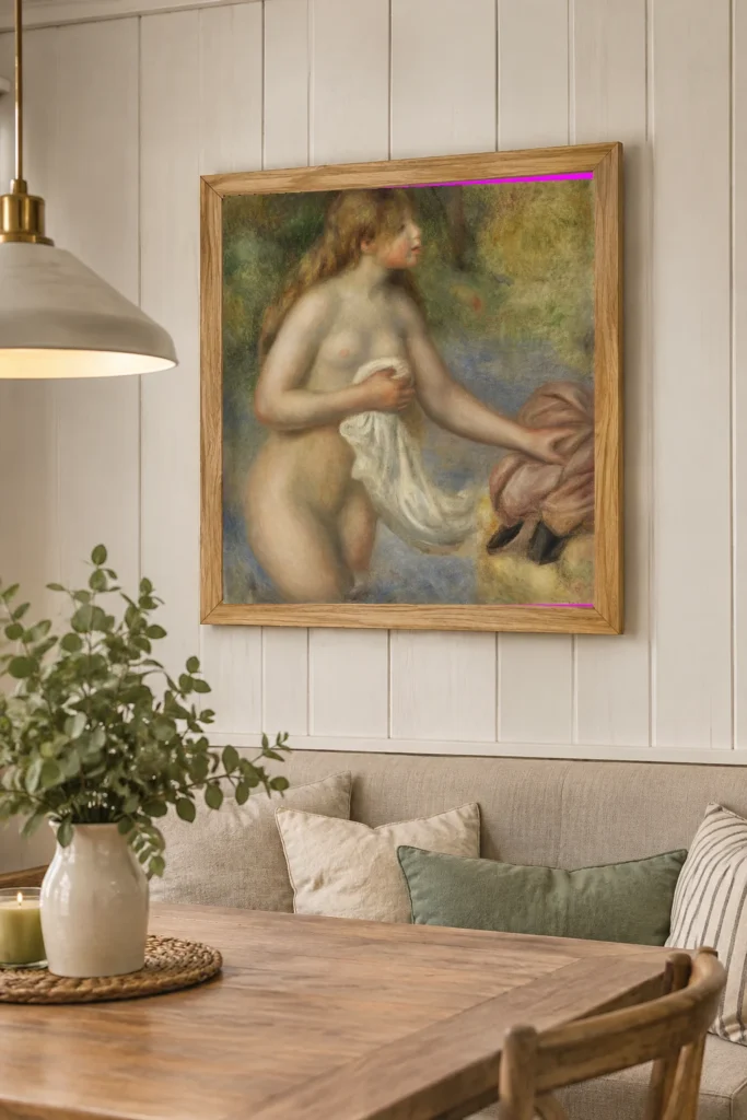 Framed print of Bather (Baigneuse) hanging on a wall in a furnished room